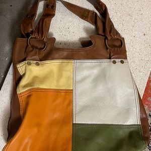 Soft leather Lucky bag. No worn corners. Straps perfect. No tears/stains inside.